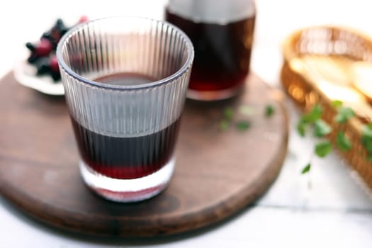 Grape juice poured into a stylish glass
