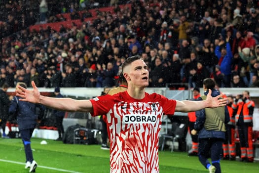 Roland Sallai (SC Freiburg) celebrates his goal in front of the fans to equalize 2:2 in the match of the Football Europa League - Qualification 1/8 Final,SC Freiburg vs RC Lens