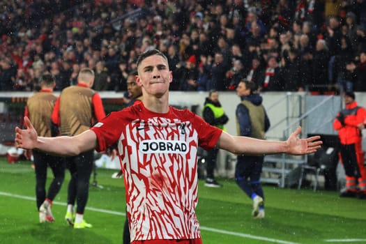 Two-time goalscorer Roland Sallai (SC Freiburg) enjoys the moment and is celebrated by the fans at the match of the Football Europa League - Qualification 1/8 Final,SC Freiburg vs RC Lens