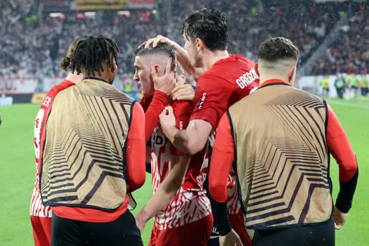 Jubilation,hustle and bustle,merriment - The Freiburg players celebrate the 2:2 equalizer of Torschuetze,goal scorer Roland Sallai (SC Freiburg) at the match of the Football Europa League - Qualification 1/8 Final,SC Freiburg vs RC Lens