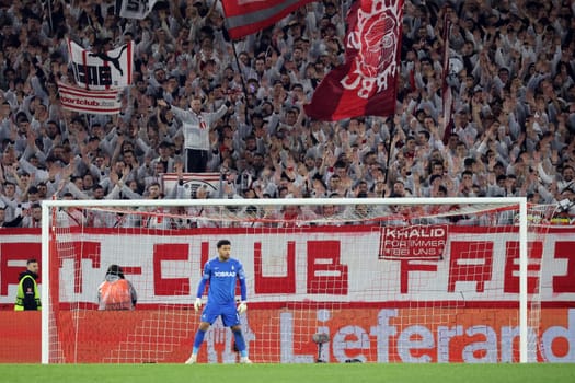 Goalkeeper Noah Atubolu (SC Freiburg) is in goal and behind him the fans in the stands are creating a strong atmosphere at the match of the Football Europa League - Qualification 1/8 Final,SC Freiburg vs RC Lens