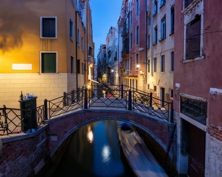Canal and bridge in Venice at sunset