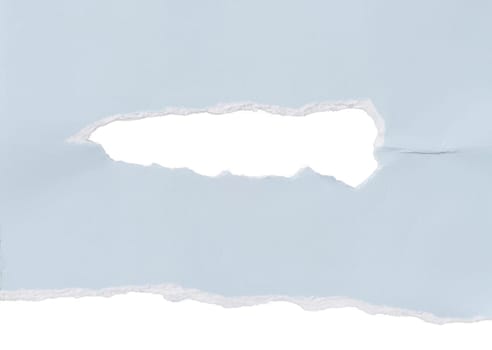 Torn piece of blue cardboard with a hole on an isolated background