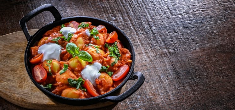 Creamy tomato gnocchi with burrata, basil and garlic.