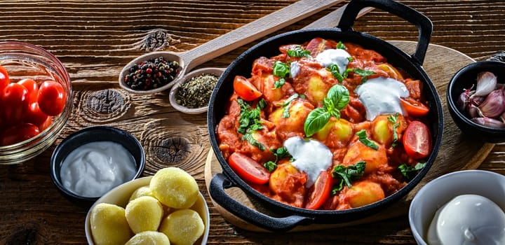 Creamy tomato gnocchi with burrata, basil and garlic.