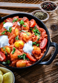 Creamy tomato gnocchi with burrata, basil and garlic.