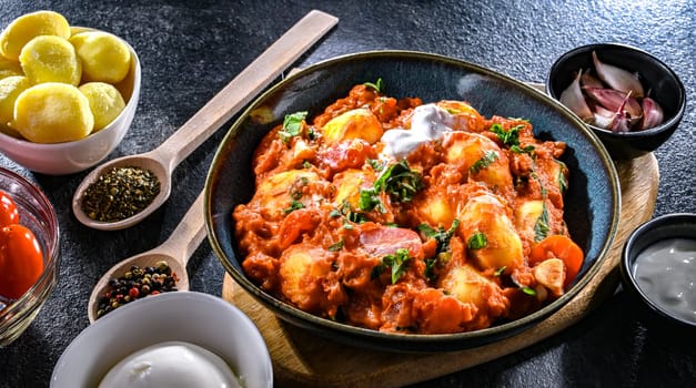 Creamy tomato gnocchi with burrata, basil and garlic.