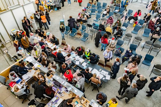 POZNAN, POL - MAR 12, 2022: Document checkpoint at humanitarian aid for Ukraine organized by civil society in Poland after Russian invasion on Ukraine in 2022