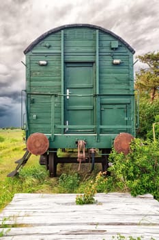old abandoned lonely railway carriages on disused train route