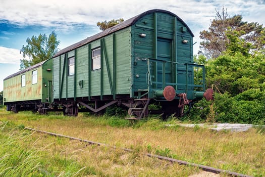 old abandoned lonely railway carriages on disused train route