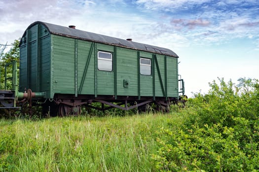 old abandoned lonely railway carriages on disused train route
