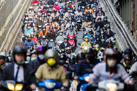Taipei, Taiwan 19 April 2023: Crowd of motorcycles over the Taipei bridge