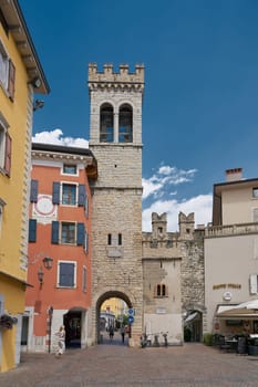 The medieval town gate Porta di San Michele in the old town of Riva del Garda on Lake Garda in Italy