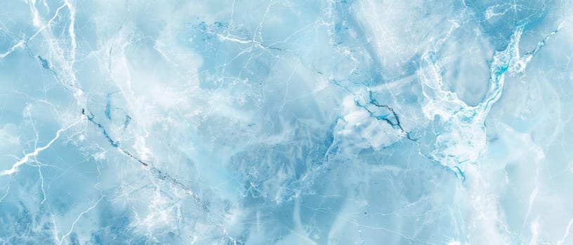 This image portrays the cool tranquility of ice blue marble with soft white veining, reminiscent of a frozen landscape under a winter sky