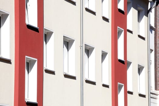 Window front, modern, red and white residential building, Findorff, Bremen, Germany