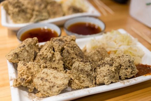 Deep fry stinky tofu on the white dish