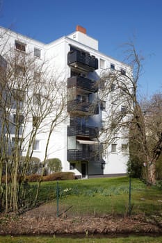 Modern, white residential building in spring, Findorff, Bremen, Germany, Europe