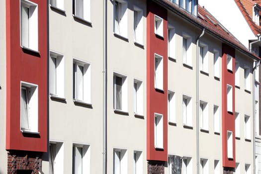 Window front, modern, red and white residential building, Findorff, Bremen, Germany