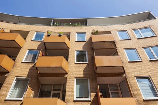 Modern, brown residential building from the frog's perspective, Bremen, Germany