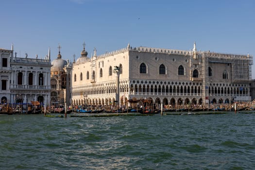 Venice, Italy - September 6, 2022: The Doge's Palace and Piazzetta San Marco seen from Bacino di San Marco. Venice, Italy