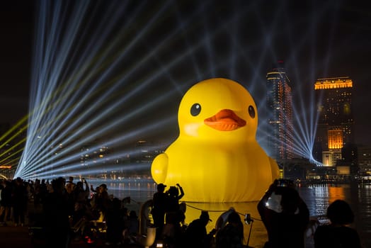 Taiwan, 31 January 2024: Kaohsiung bay under night show with rubber duck