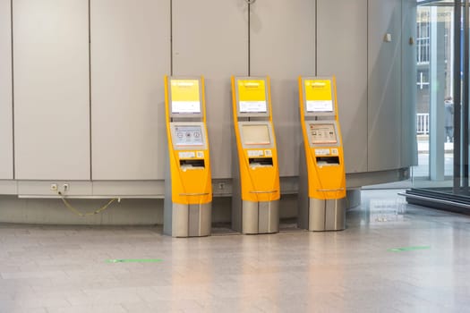 Frankfurt, Germany - February 7, 2022: Lufthansa check in machine at Frankfurt international airport without passenger.