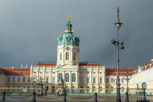 Berlin, Germany - February 7, 2022: view to castle Charlottenburg in Berlin under dark clouds.