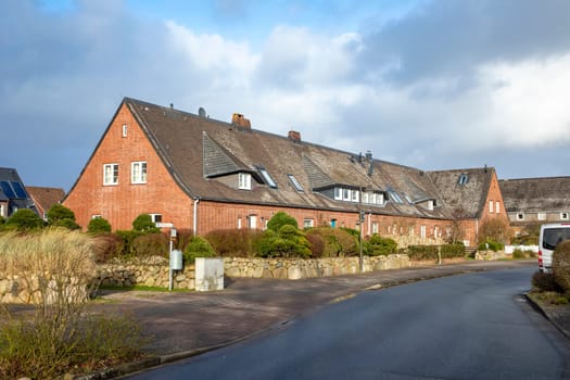 List, Germany - February 17, 2022: scenic old historic brick houses in List,  a small village at the island of Sylt, Germany.