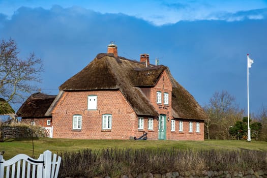 List, Germany - February 17, 2022: scenic old historic brick houses in List,  a small village at the island of Sylt, Germany.
