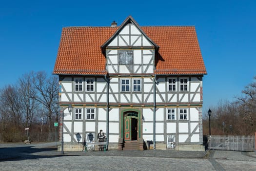 Neu Anspach, Germany - March 10, 2022:  old half timbered house  at Hessenpark in Neu Anspach. Since 1974, more than 100 endangered buildings have been re-erected at the Hessenpark Open-Air Museum.