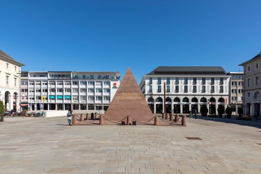 Karlsruhe, Germany - April 17, 2022: Karlsruhe Pyramid, city's founder grave, red sandstone monument located on market square of Karlsruhe.