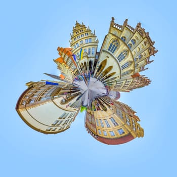 Muenster, Germany - April 29, 2022: scenic view to facade of old historic houses in panoramic view at the Prinzipal markt engl: square of the prince in Muenster in tiny planet style.