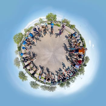 Frankfurt, Germany - May 7, 2022: group of bicycle sportler meet and discuss the route before starting the race.