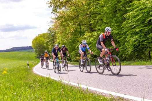 Frankfurt, Germany - May 7, 2022: group of bicycle sportler have a race in the beautiful Rheingau area in Germany.