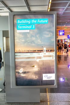 Frankfurt, Germany - May 17, 2022: advertising for new terminal 3 in Frankfurt, airport on a poster.