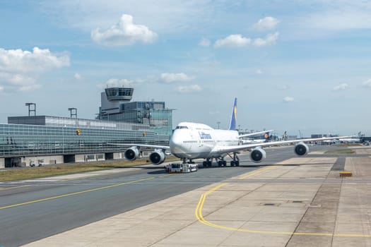 Frankfurt, Germany - May 17, 2022: lufthansa aircraft at the taxiway on the way to runway.