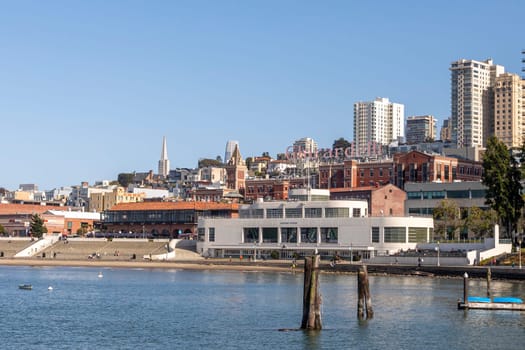 San Francisco, USA - May 18, 2022: view to famous white modern Maritime Museum at the bay of San Francisco in early morning light.