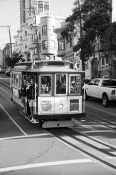 San Francisco, USA - May 24, 2022: historic  Cable Car Powell Hyde Line on turntable at Powell Street terminal at Market Street in downtown San Francisco, California CA, USA.