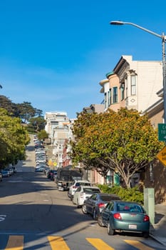 San Francisco, USA - May 18, 2022:  old houses in downtown San Francisco in bright light.