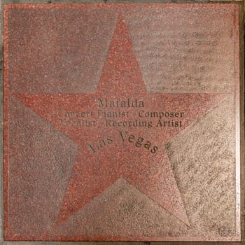 Las Vegas, USA - May 23, 2022: Mafalda is honored with a name tile at walk of fame in Las Vegas at the strip.