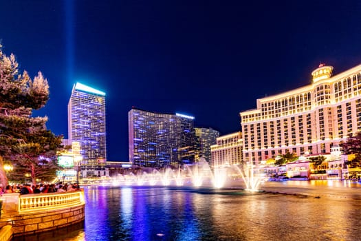 Las Vegas, Nevada, USA -May 23, 2022 : The Fountains of Bellagio at night. This feature performs choreography with water, music and light in front of the Bellagio hotel and casino.