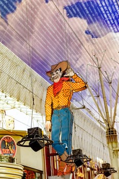 Las Vegas, USA - May 24, 2022: Vegas Vic is the nickname of the Las Vegas cowboy neon sign, which used to be outside the Pioneer Club in 1951 and came to be the mascot of Las Vegas.