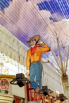 Las Vegas, USA - May 24, 2022: Vegas Vic is the nickname of the Las Vegas cowboy neon sign, which used to be outside the Pioneer Club in 1951 and came to be the mascot of Las Vegas.