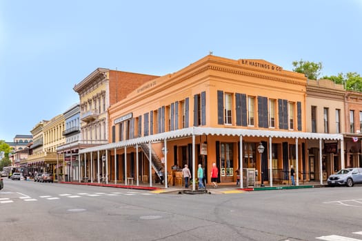 Sacramento, USA - June 4, 2022: Street of the Old Town Sacramento with historic houses.