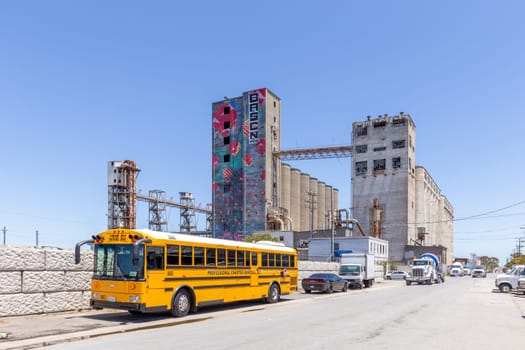 San Francisco, USA - June 6, 2022: Large old rundown cement factory along the water in San Francisco, California.