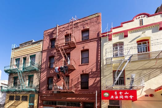 San Francisco, USA - June 6, 2022: view to streets and buildings in Chinatown, California street. San Francisco Chinatown is the largest Chinatown outside of Asia and the oldest Chinatown in the US.