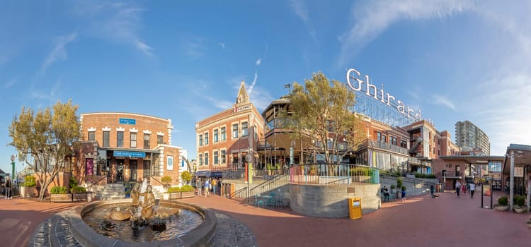 San Francisco, USA - June 6, 2022:  view to famous Ghirardelli  shop and chocolate factory at the bay of San Francisco in early morning light.
