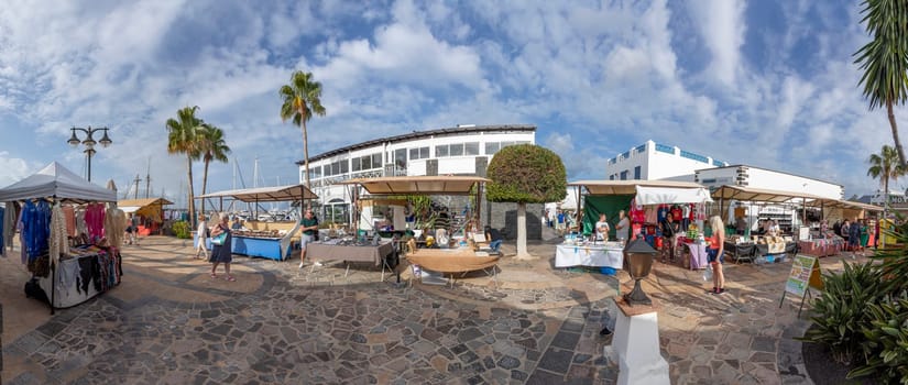 Playa Blanca - February 6, 2023: Saturday morning market in the Marina Rubicon area in Playa Blanca for tourists.