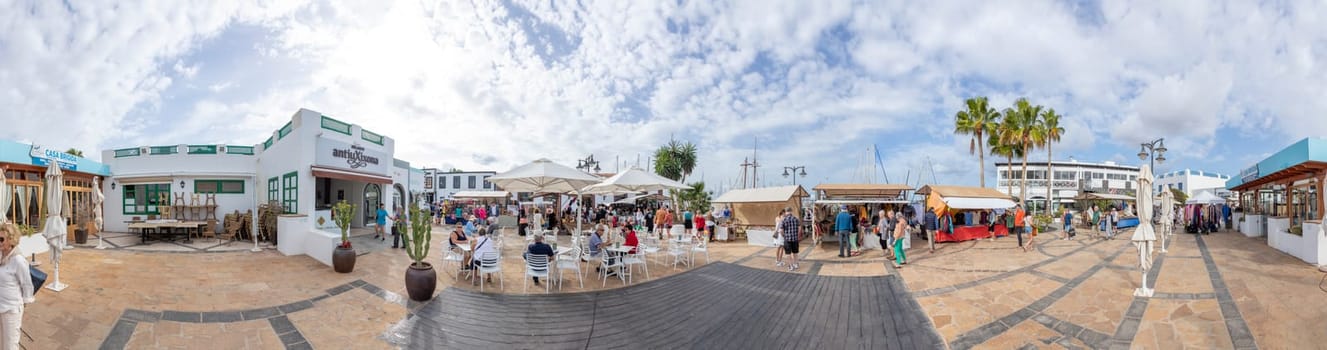 Playa Blanca - February 6, 2023: Saturday morning market in the Marina Rubicon area in Playa Blanca for tourists.