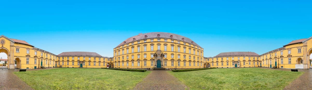 Osnabrueck, Germany - February 18, 2023: panoramic view to scenic castle in Osnabrueck, Germany under blue sky.